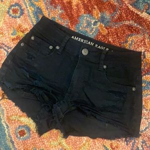 AE high rise black raw hem jean shirt